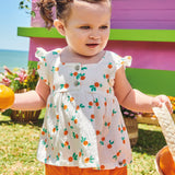 Conjunto blusa y short estampado naranja
