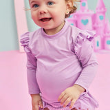 Polera manga larga UV50+ con volantes y brillos