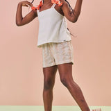 Conjunto niña flores coral verano